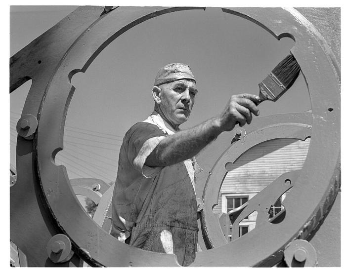 Reginald J Law painting the florets